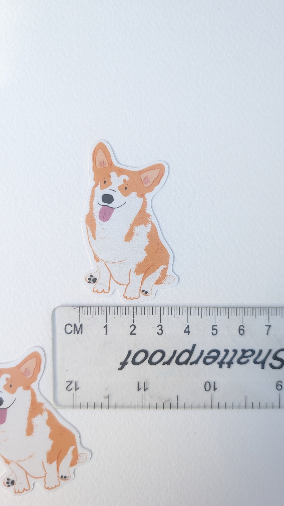 Corgi dog illustrated die cut sticker. Vinyl waterproof sticker for laptops, notebooks, water bottles